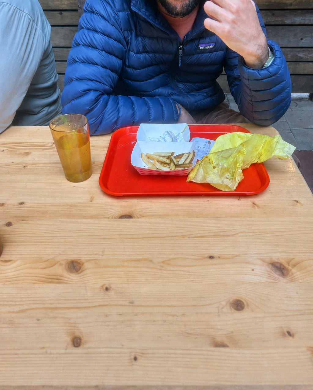 A man at a wooden table